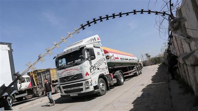 Click to enlarge Palestinian truck drivers park their lorries