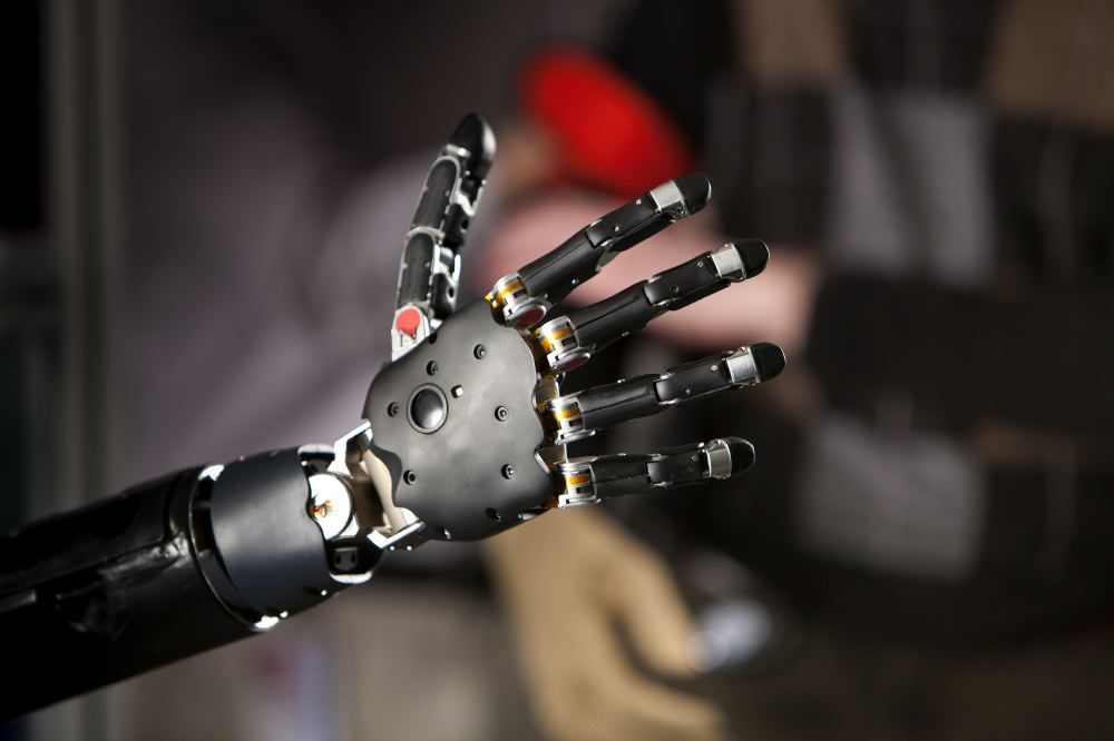 Click to enlarge A brain-controlled prosthetic hand and arm co-developed by the Applied Physics Laboratory and the Federal Drug Administration.