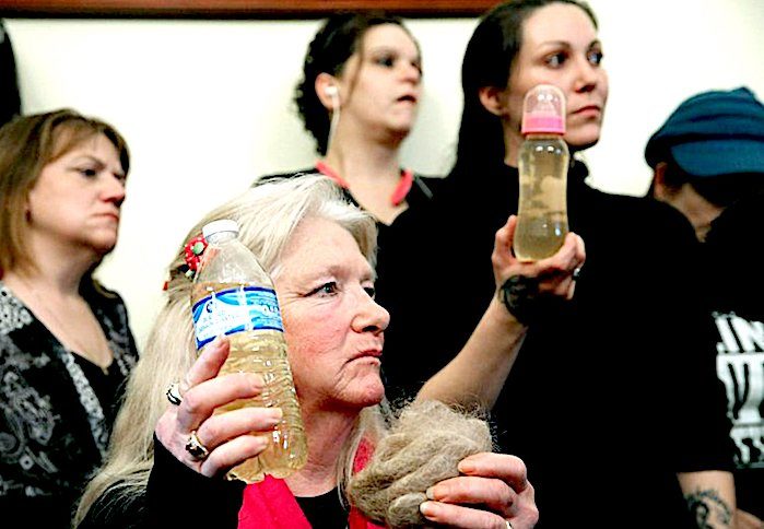 Click to enlarge Flint water woman
