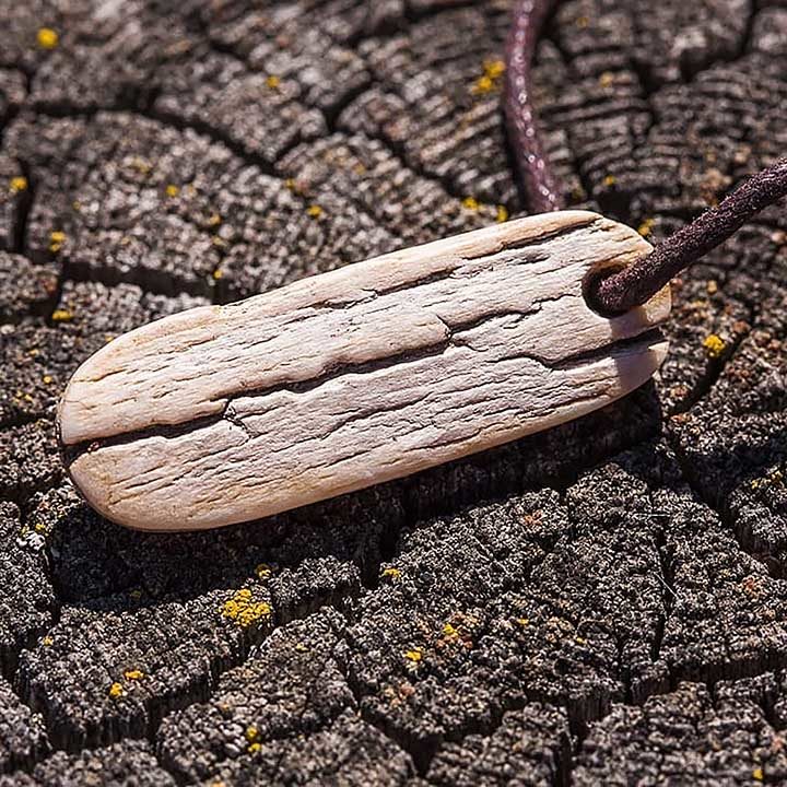 Click to enlarge The fifth grade student Pavel discovered the ‘jewellery’ decorated with ancient Turkic runic inscriptions.