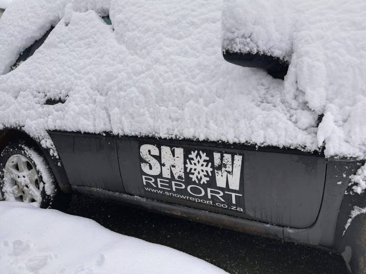A Snow Report SA vehicle is covered in snow at the Matroosberg Reserve in Ceres‚ Western Cape, on July 2, 2018.