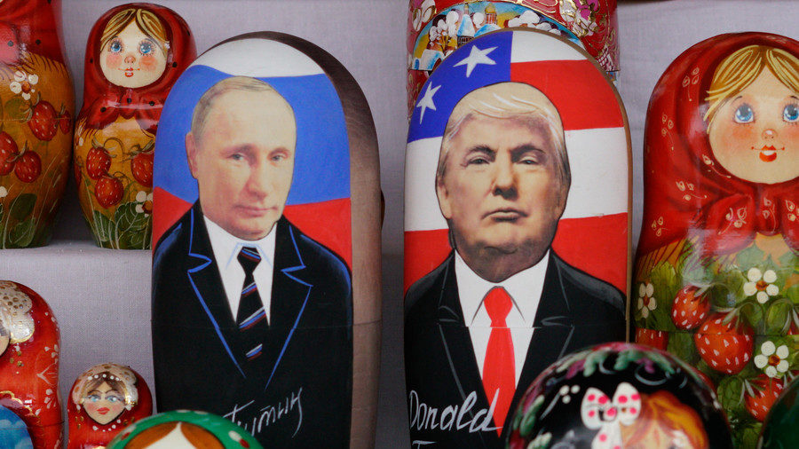 Russian Matryoshka dolls depicting t Vladimir Putin and Donald Trump are seen on sale at flea market in Moscow
