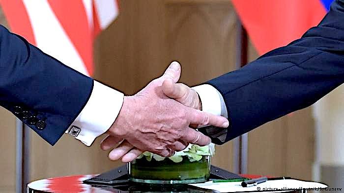 Click to enlarge PutinTrump handshake