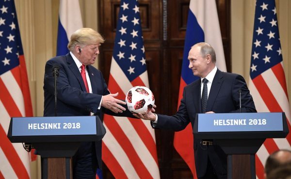 Trump gets football from Putin