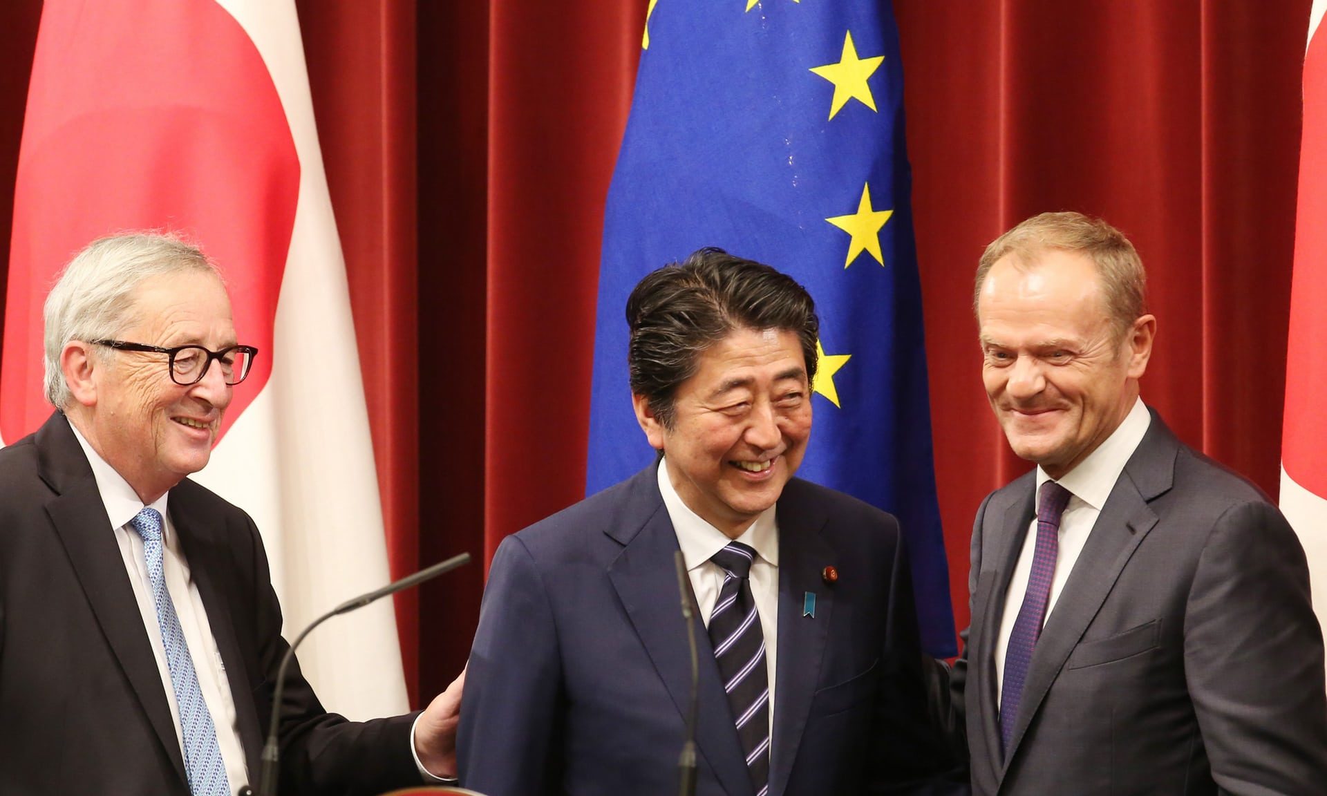 Click to enlarge Jean-Claude Juncker (left), Shinzo Abe (centre) and Donald Tusk