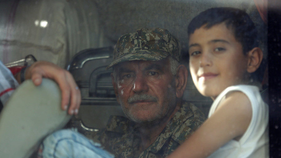 A loyalist fighter and a child