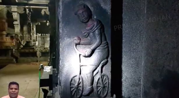 carving bicycle India temple