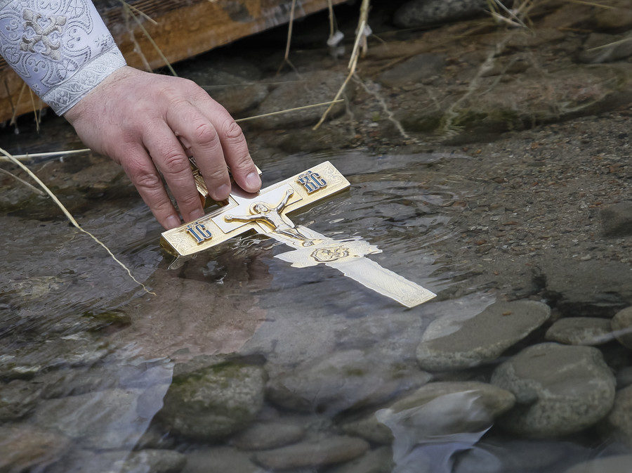 A Russian Orthodox Priest blessing water