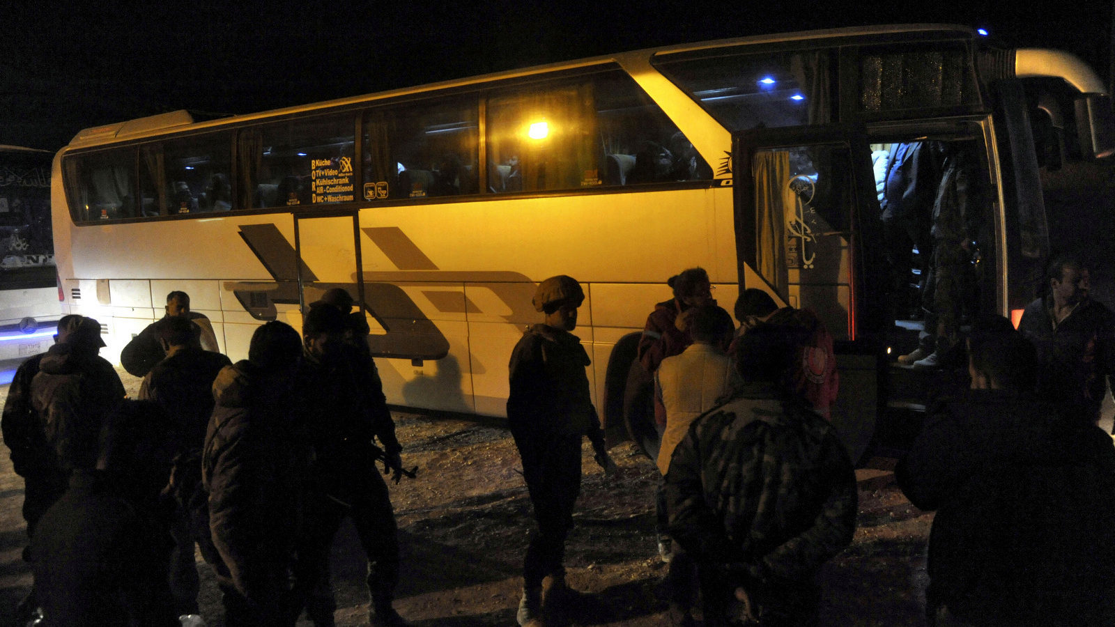 Click to enlarge White Helmet evacuation