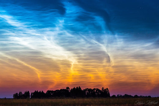 Click to enlarge Noctilucent clouds