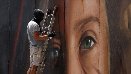 Italian artist who painted Ahed Tamimi mural arrested in Israel