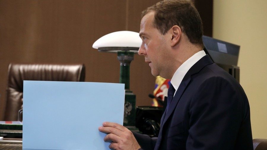 Click to enlarge Russian PM Medvedev attends
