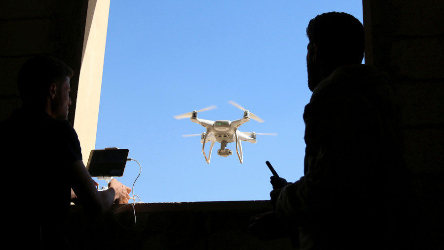 Click to enlarge The Syrian militants operating a drone.