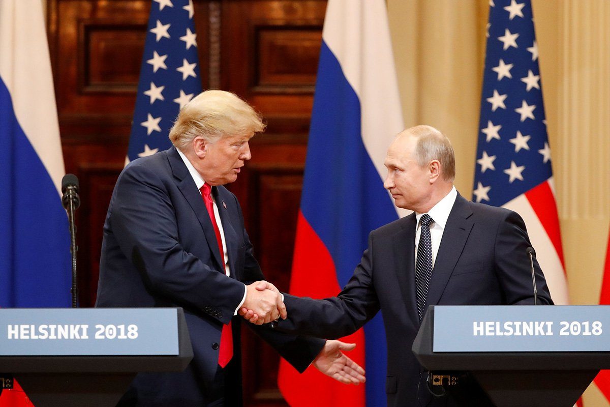Click to enlarge Trump Putin handshake helsinki