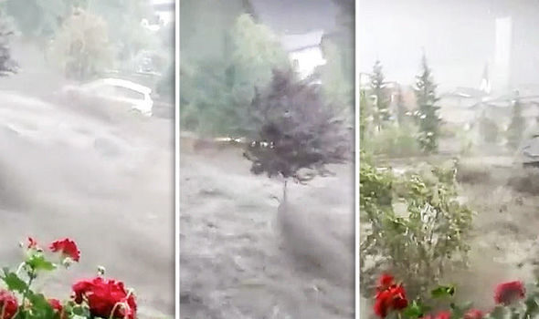 Austria news: Dramatic footage shows major flood barrel through a Tyrol town