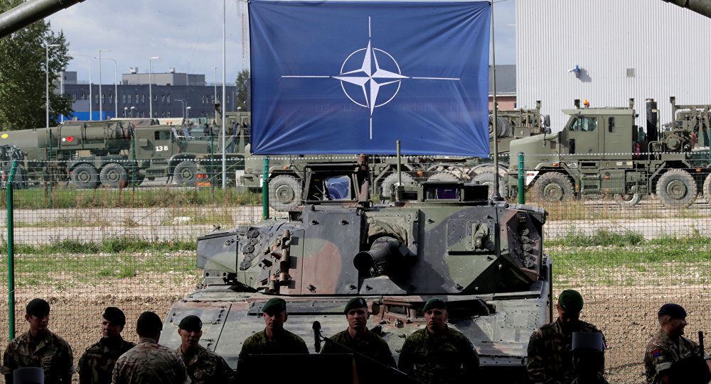 Click to enlarge NATO eFP battle group soldiers wait for NATO Secretary General Jens Stoltenberg visit in Tapa military base