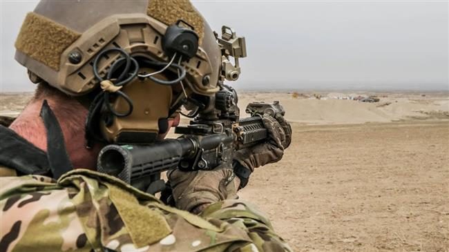 A member of US Special Forces takes a potshot at a target in Afghanistan