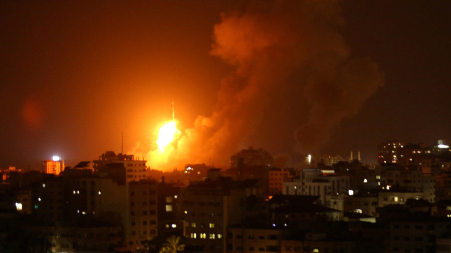 Click to enlarge An explosion during an Israeli air strike on Gaza
