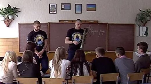 Click to enlarge soldiers azov Ukraine school weapons