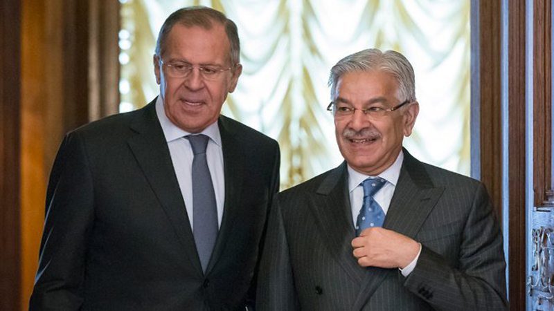 Russian Foreign Minister Sergei Lavrov, left, welcomes Pakistani Foreign Minister Khawaja Muhammad Asif during a visit to Moscow