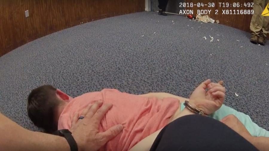 Click to enlarge autistic boy handcuffed