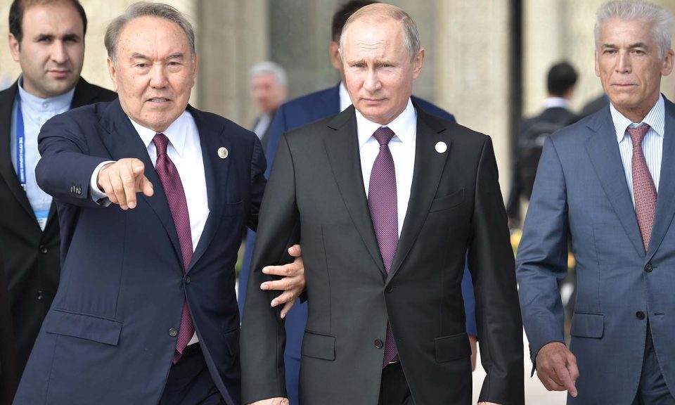 Russian President Vladimir Putin and Kazakhstan President Nursultan Nazarbayev walk along a Caspian Sea embankment while participating in the Fifth Caspian Summit in Aktau, Kazakhstan.