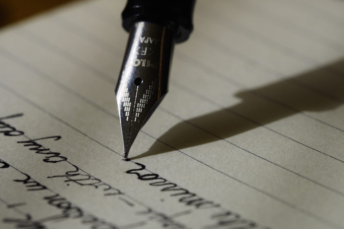 Click to enlarge Writing by hand