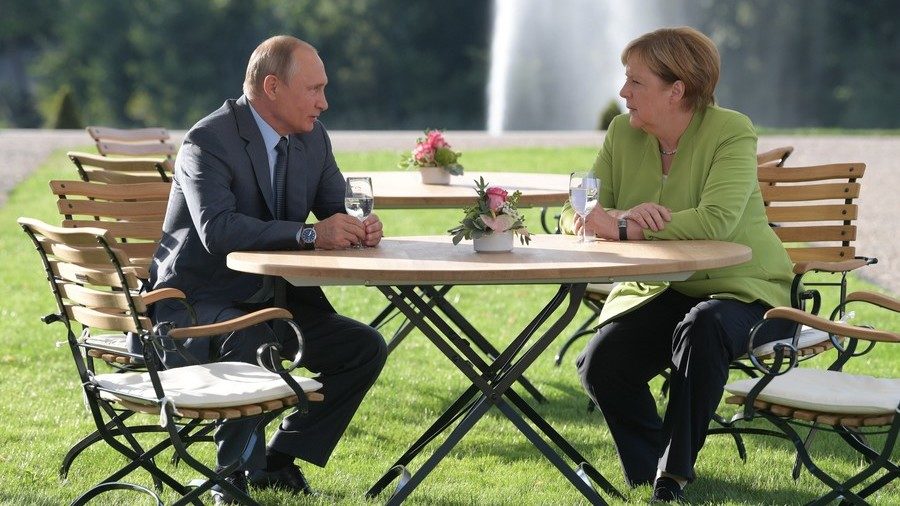 Click to enlarge Angela Merkel and Vladimir Putin