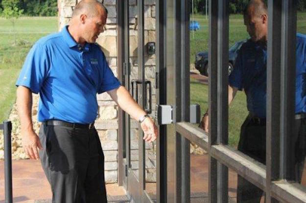 Click to enlarge Man opening door microchip
