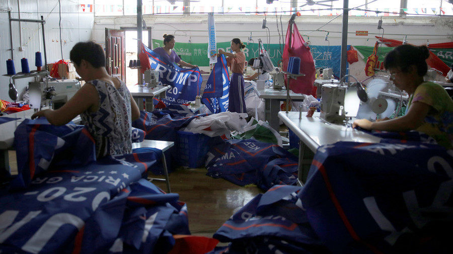 Click to enlarge Chinese workers American flags Trump