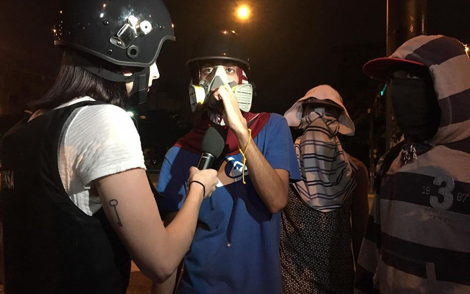 Click to enlarge Journalist Abby Martin interviews Venezuelan opposition protesters.