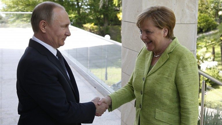 Click to enlarge Putin Merkel