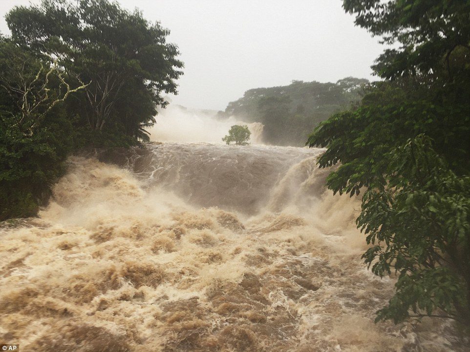 Click to enlarge Pictured is flooding at Wailuku River in Hilo