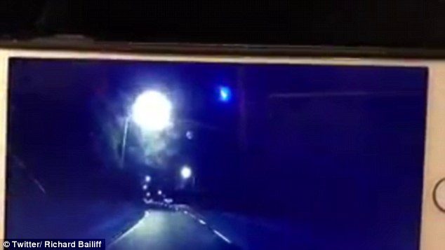 Dash cam footage shared on Twitter shows the bright blue light descending through the night skies in Perth