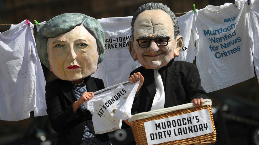 puppets Rupert Murdoch and UK PM Theresa May