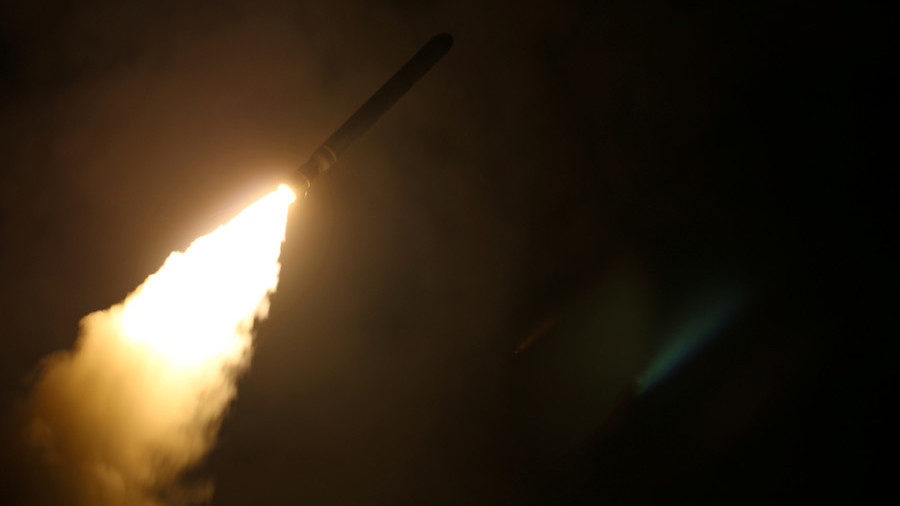 Click to enlarge The US Navy guided-missile destroyer USS Laboon fires a Tomahawk