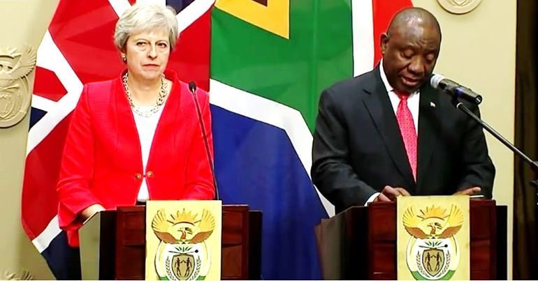 Click to enlarge Theresa May african leader