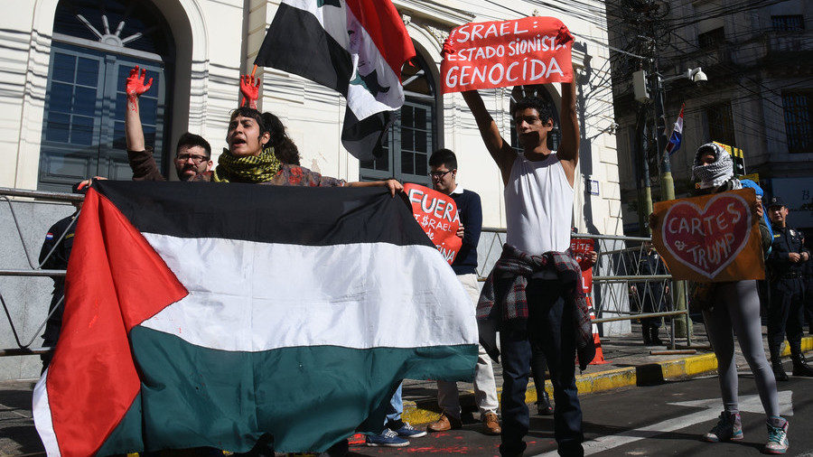 Activists protest outside the Paraguayan foreign ministry,