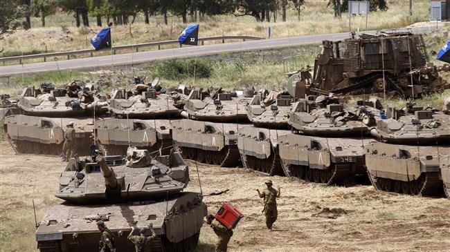 Click to enlarge military drill in the Israeli-annexed Golan Heights