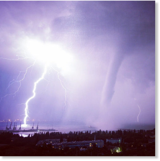 Click to enlarge Large waterspout and lightning off Feodosia, Crimea peninsula, Russia. Sept 6th 2018.