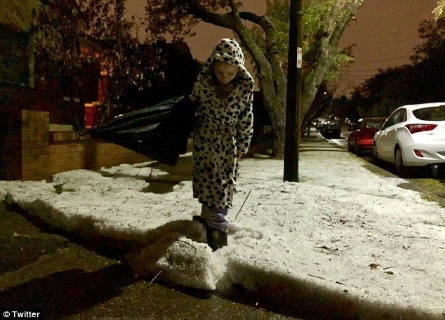 Social media users shared images of snow-like hail covering roads and footpaths across the city