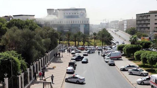 NOC headquarters with smoke rising after the attack