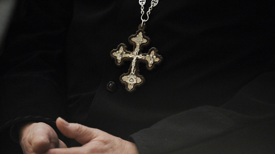 Click to enlarge A clergyman