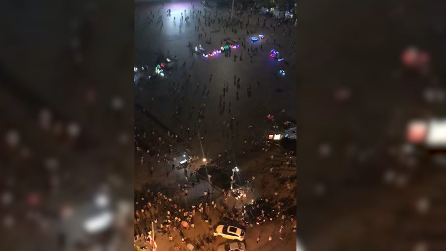 A car ploughed into crowds in a public square in central China