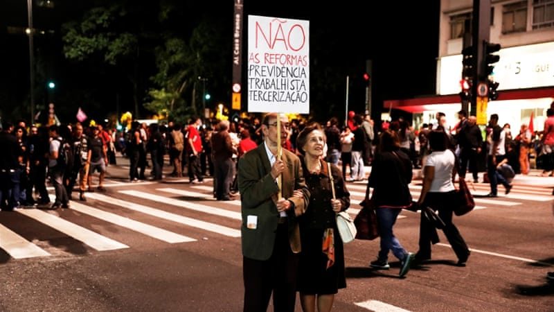 Click to enlarge protest Brazil neoliberalism