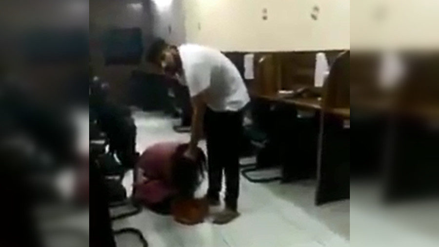 man beats woman