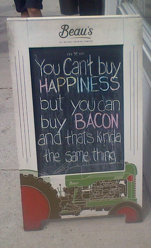 Click to enlarge Sign outside 'Dirty Food' restaurant on Dundas Street West in Toronto