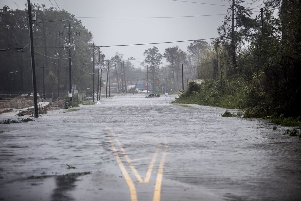 A street sits submerged in flood water n Wilmington, North Carolina