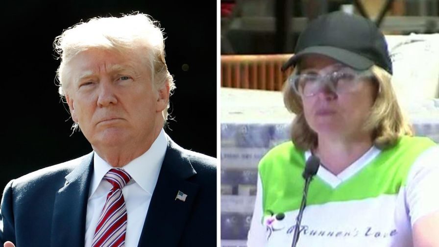 Click to enlarge Trump and Mayor Carmen Yulin Cruz