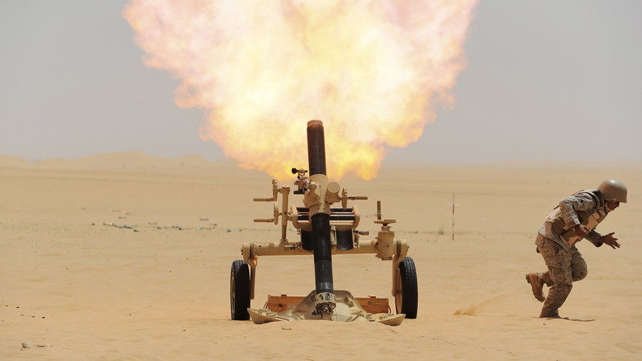 Saudi soldier fires a mortar